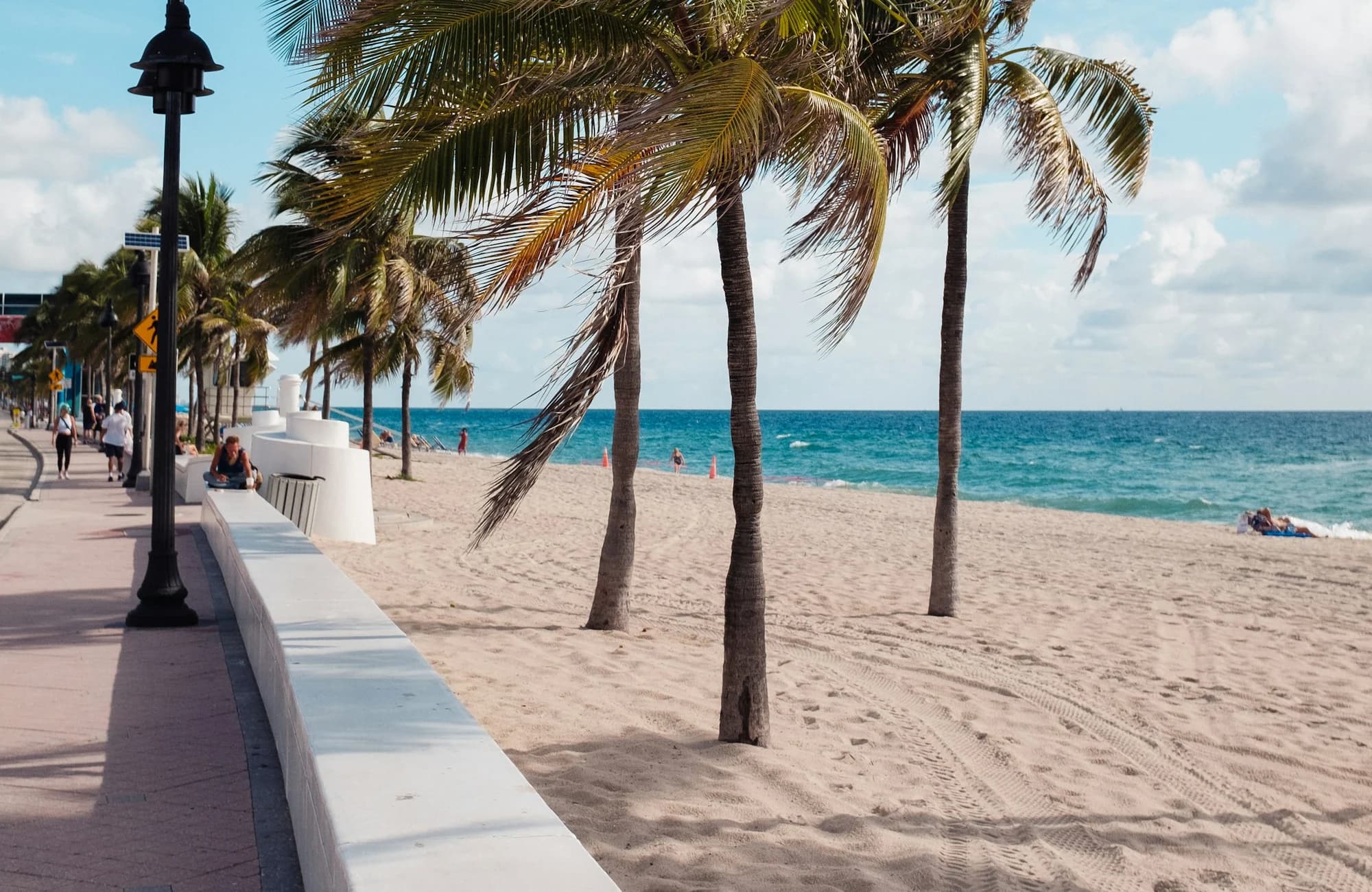 A palm-lined walkway along the Fort Lauderdale beachfront.