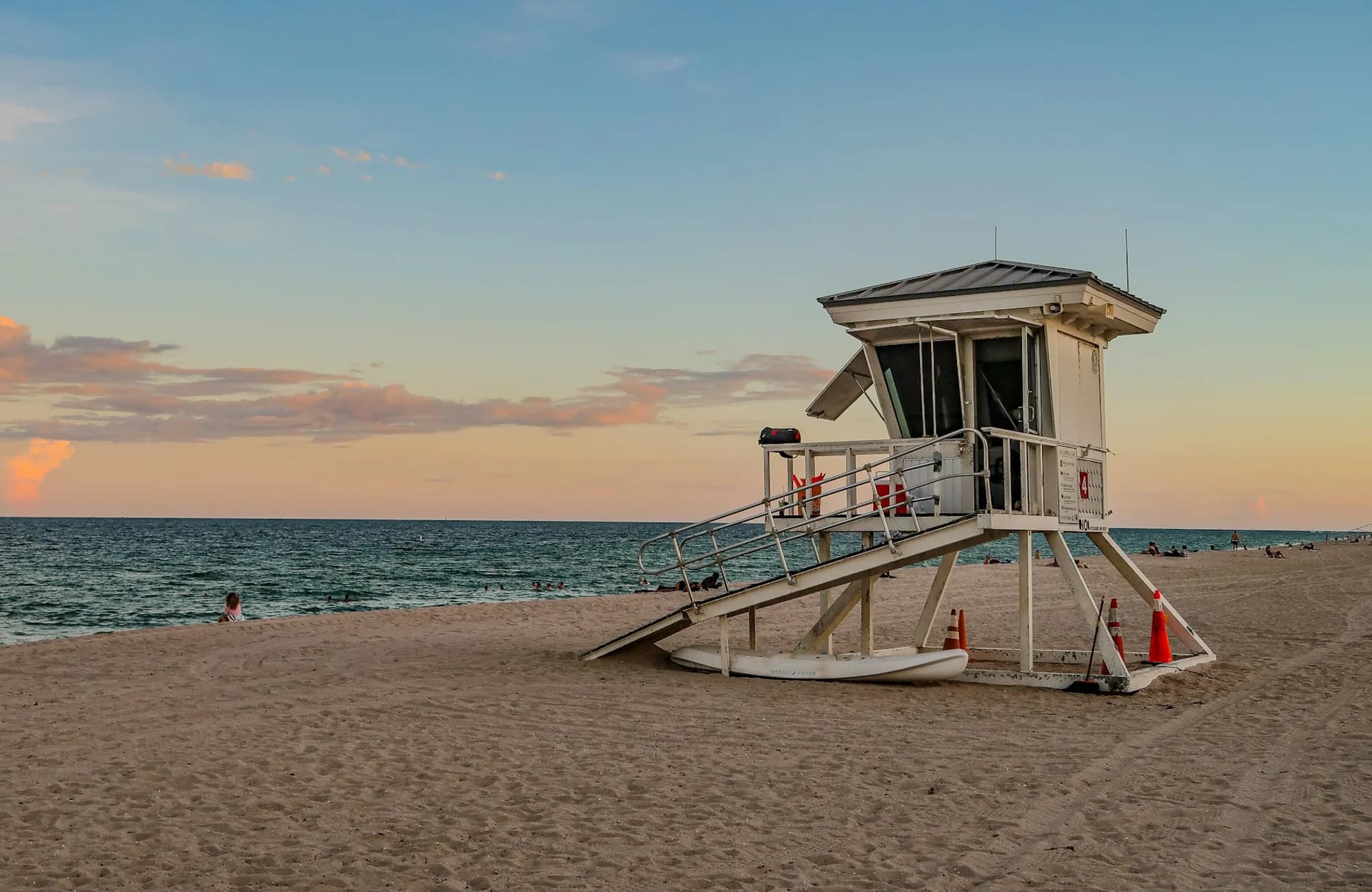 A lifeguard station on Fort Lauderdale Beach beneath an overcast sky.