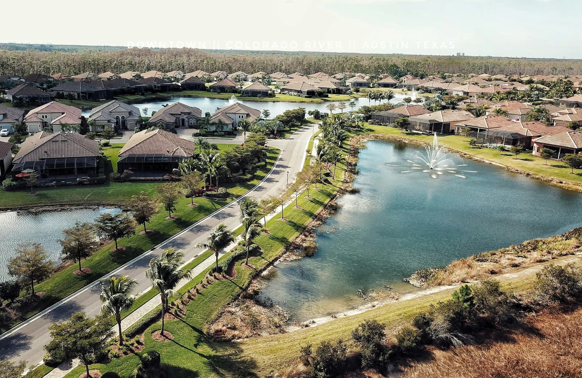 Fort Myers neighborhoods, waterways, and tree-lined streets seen from above.