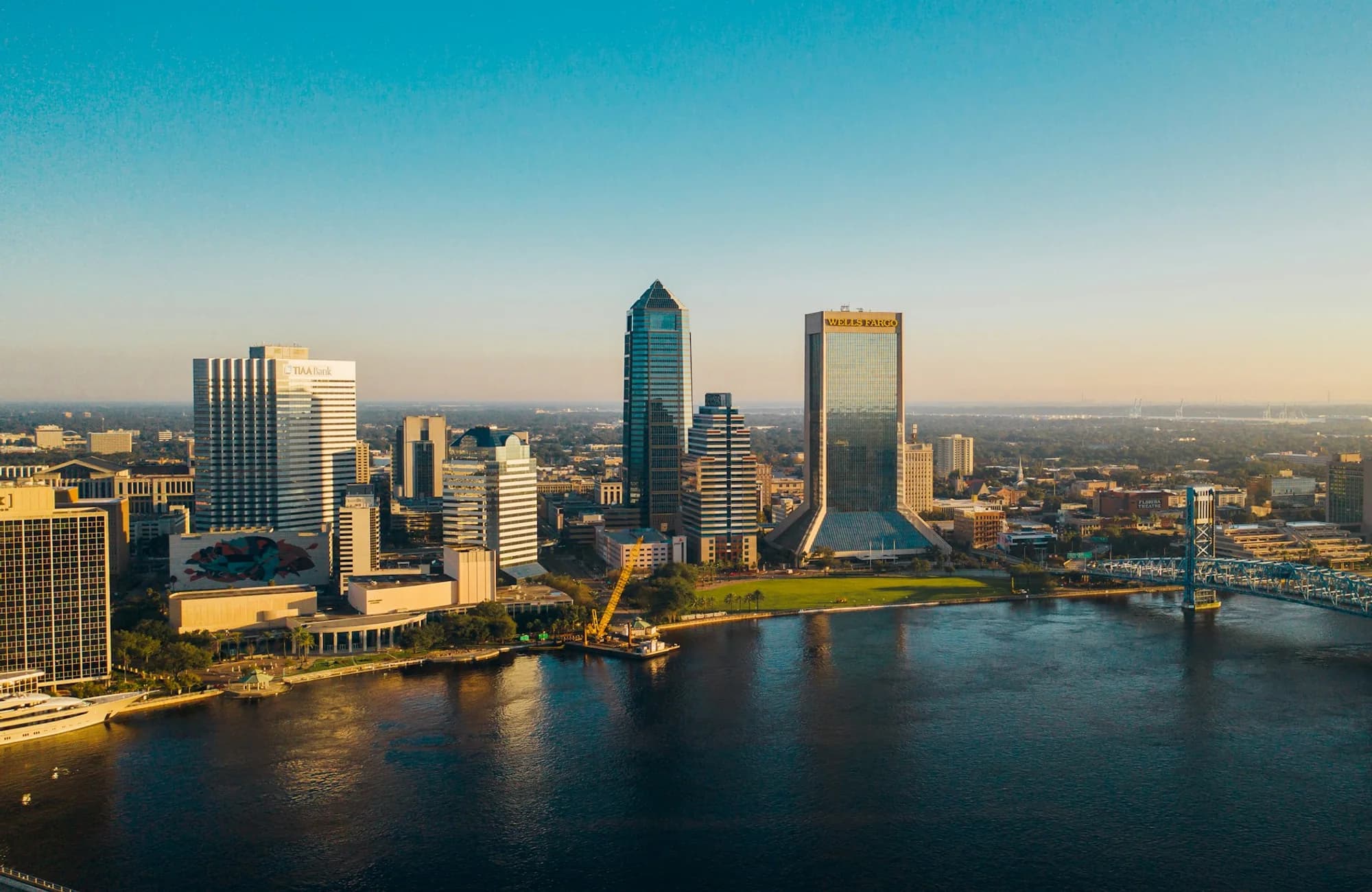 The Jacksonville skyline beneath a clear blue sky.