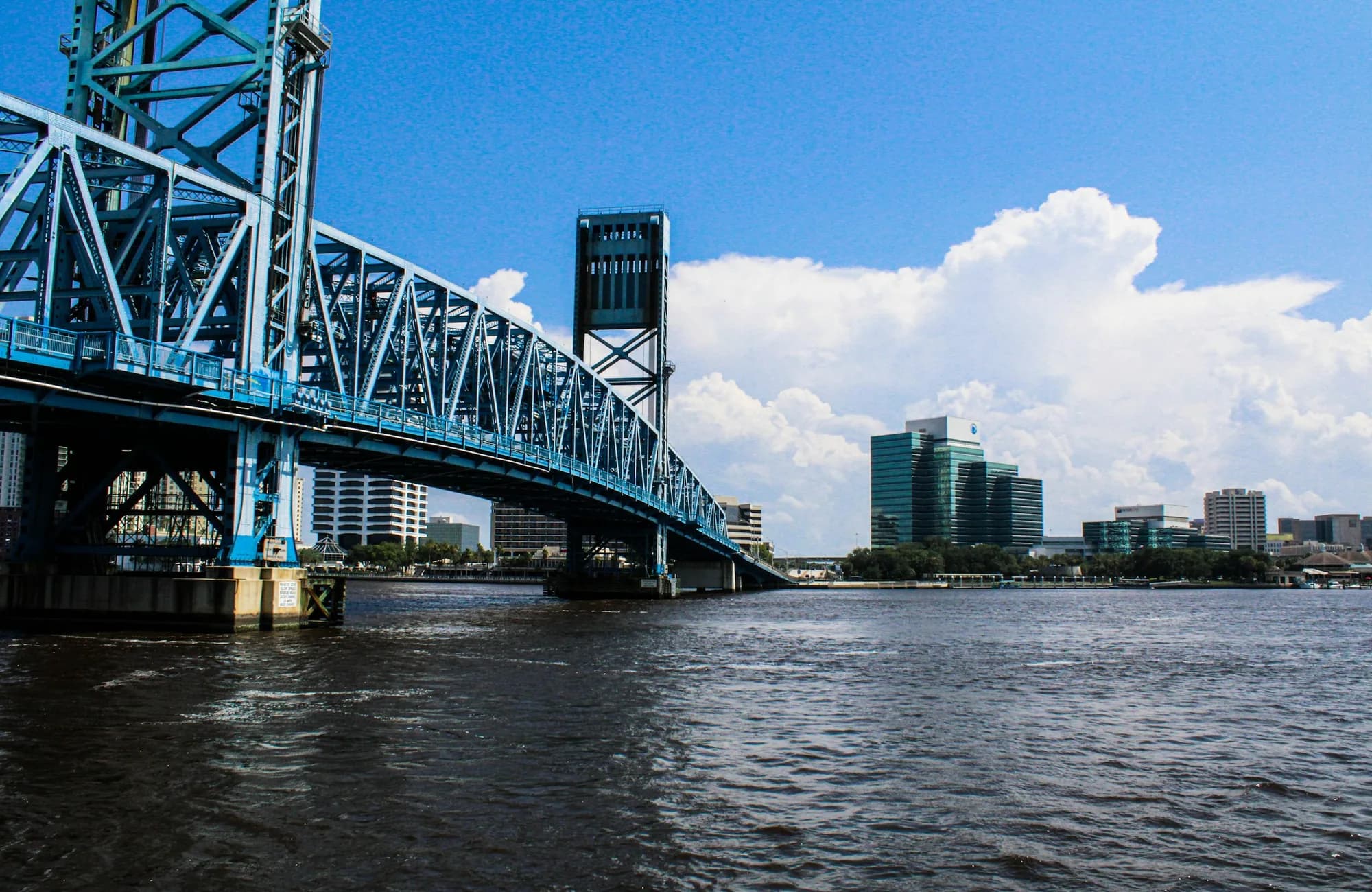 A Jacksonville bridge crossing the St. Johns River toward downtown.
