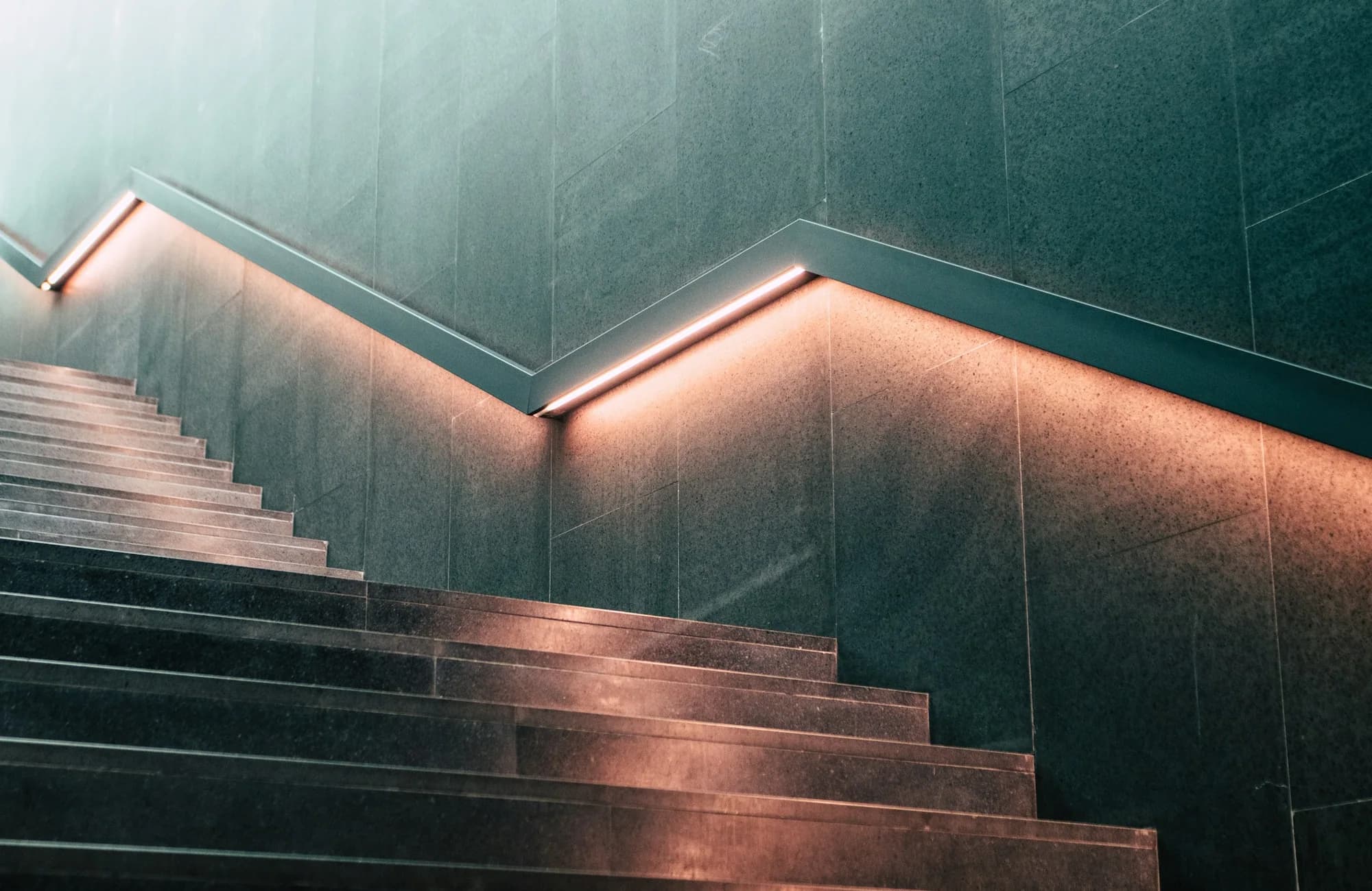 A modern interior stairway with strong architectural lines.